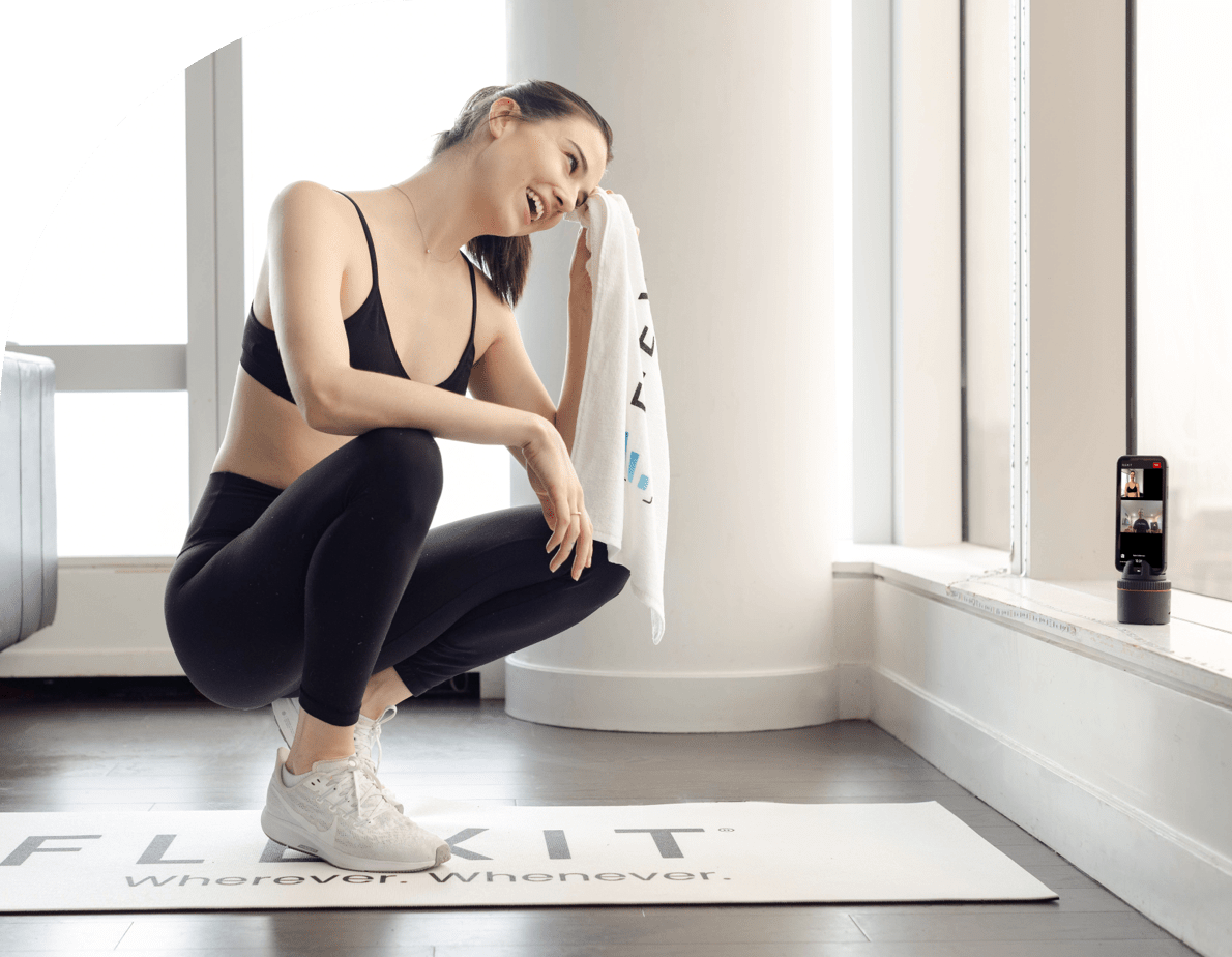 FlexIt user cracking a smile after a good virtual personal trainer session.